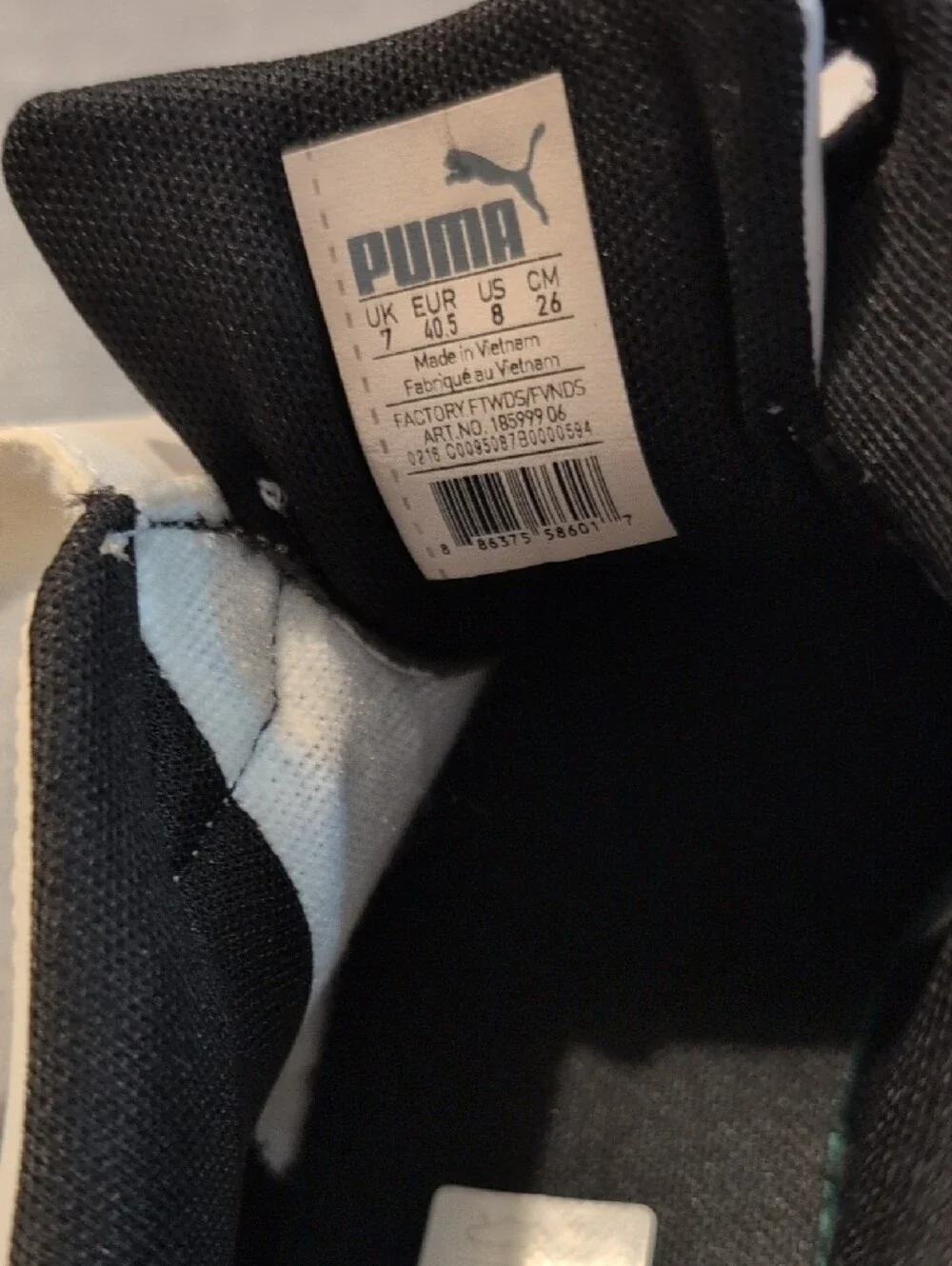 Puma Men’s White, Black and Blue Athletic Sneakers